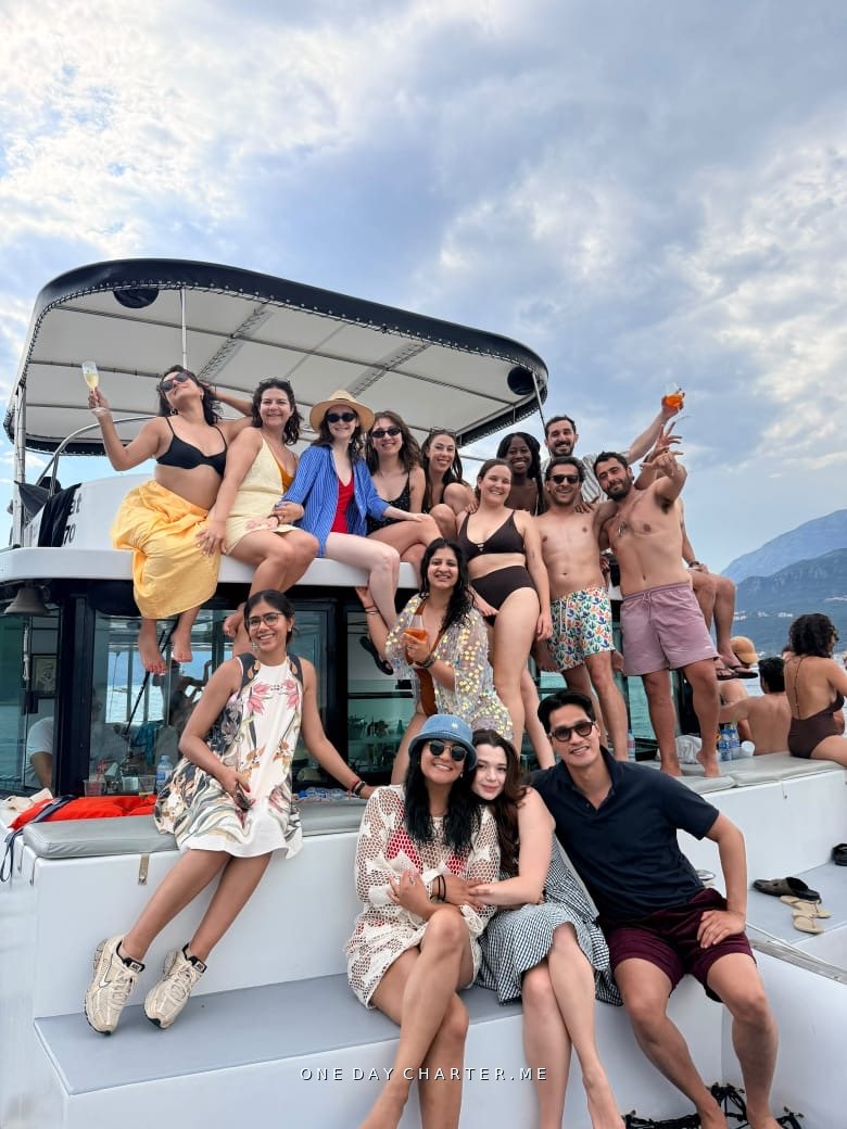 A group of master students from the LSE on a catamaran charter in Montenegro